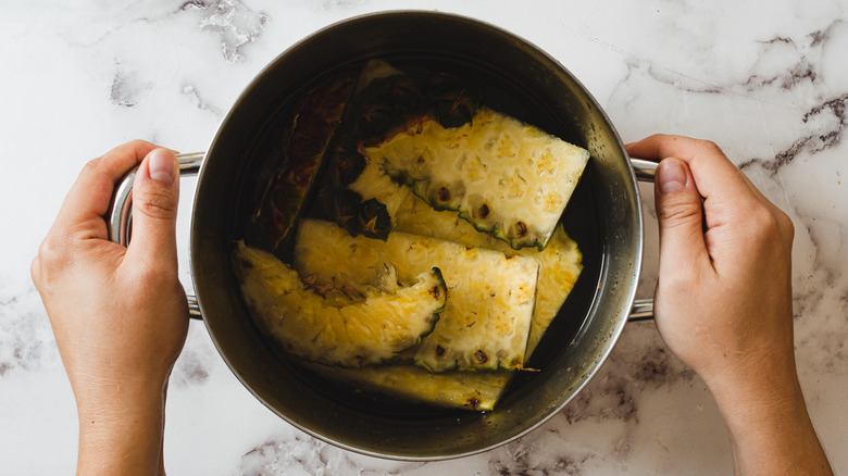 pineapple core and peel in pot