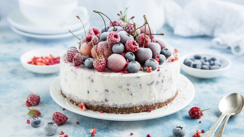 Ice cream caked topped with frozen berries