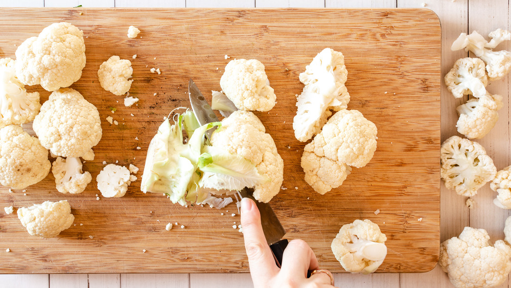 cutting off cauliflower stem