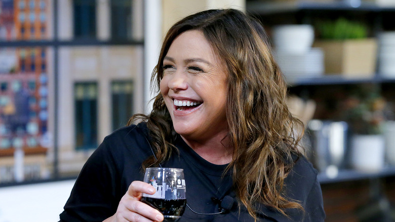 Rachael Ray drinking a glass of wine 