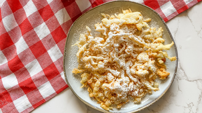 funnel cake with checkered napkin