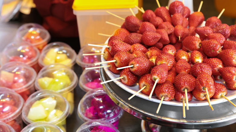 strawberry skewers and fruit cups