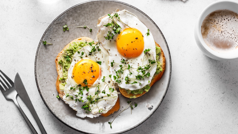 Two eggs on toast with coffee