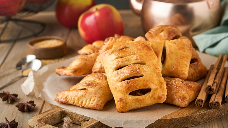 Mini apple pies on tray 