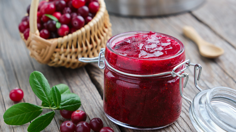 Cranberry sauce with basket of cranberries