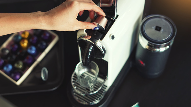 K-cup being put in a machine