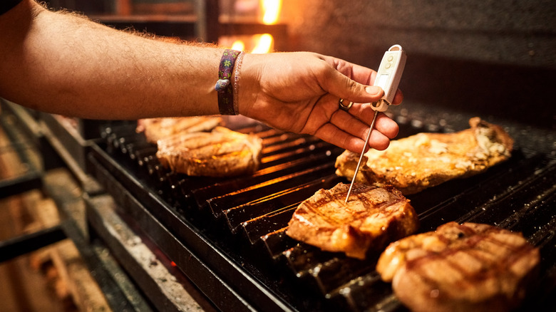 Checking the steak's temperature