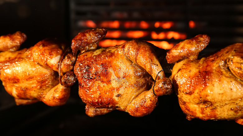 Grilled whole chickens