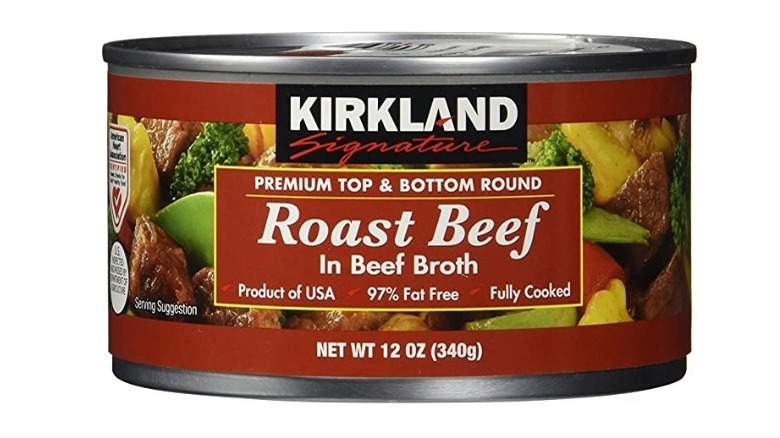 Can of cooked beef on white