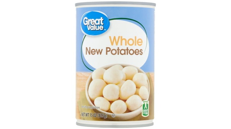 Whole potatoes in blue can