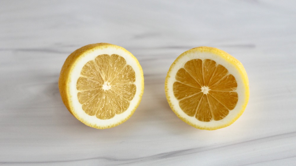 Lemon cut in half across the width