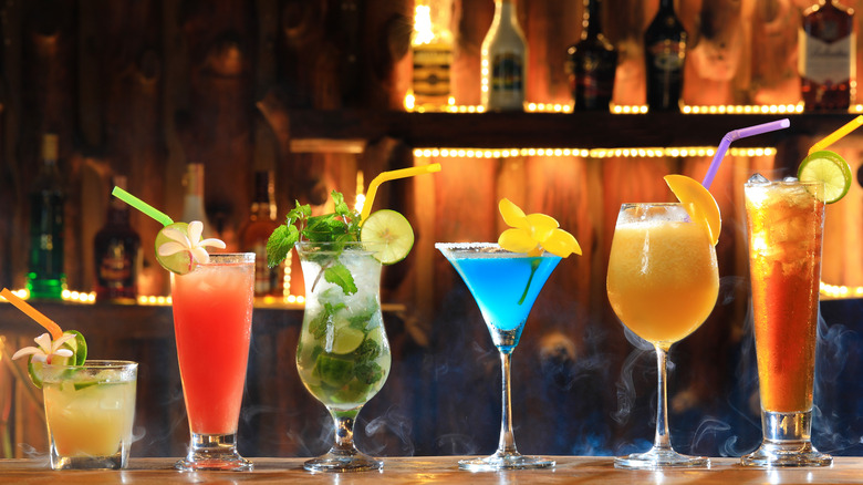 A line-up of cocktails on a bar