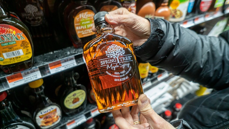 Bottle of maple syrup at the grocery store