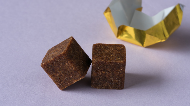 Two opened bouillon cubes