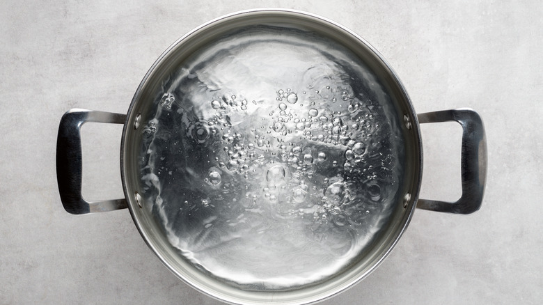 steel pot with boiling water