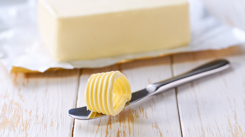 Butter stick with knife