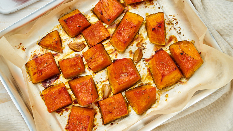 diced roasted squash on a pan