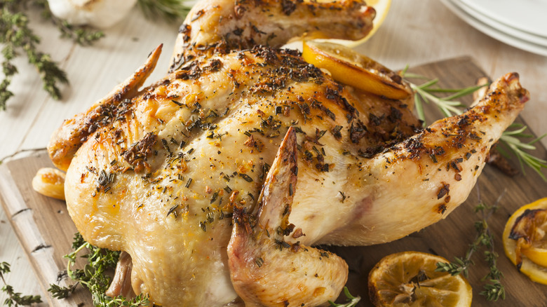 seasoned whole chicken on board