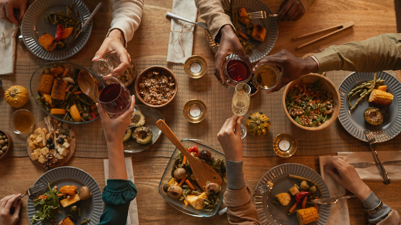 People sitting at table for holiday meal