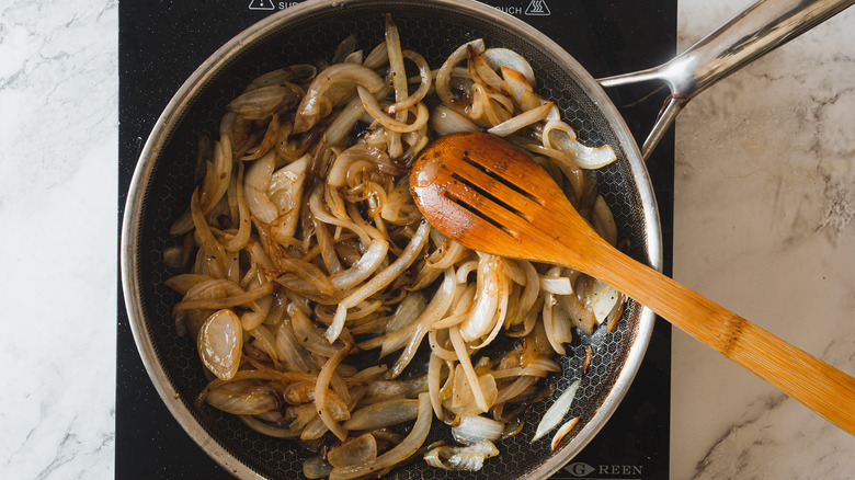 lightly sautéed onions in a pan