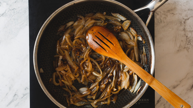 brown onions in a pan