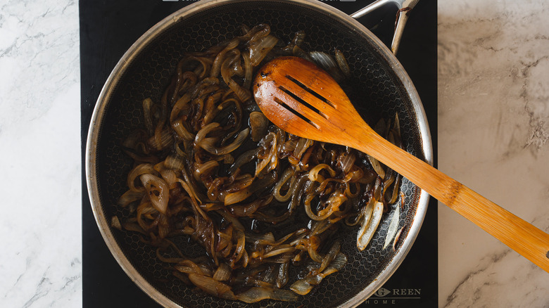 dark brown onions in a pan