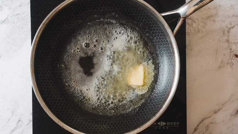 oil and butter on pan