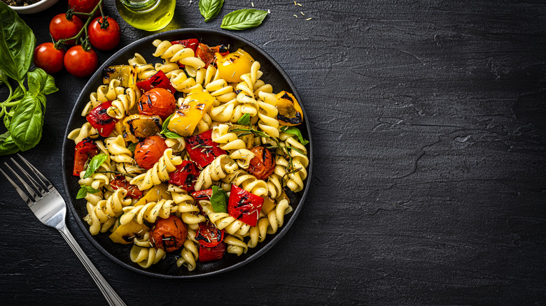 pasta salad in black bowl