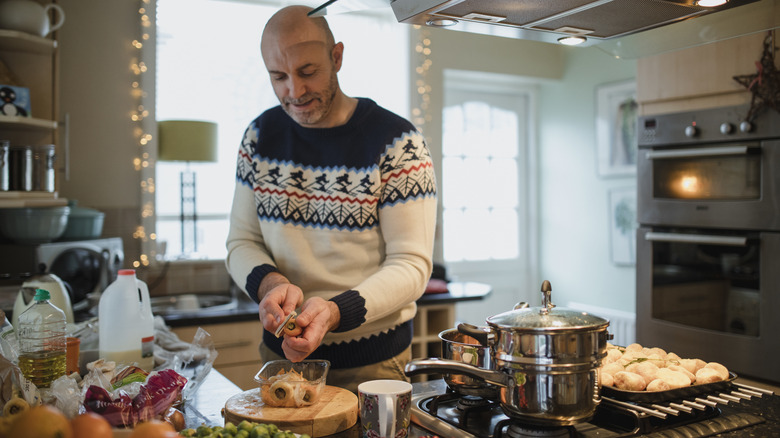 person cooking during the holidays