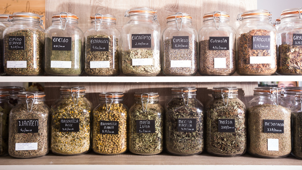 Variety of herbs and spices in jars