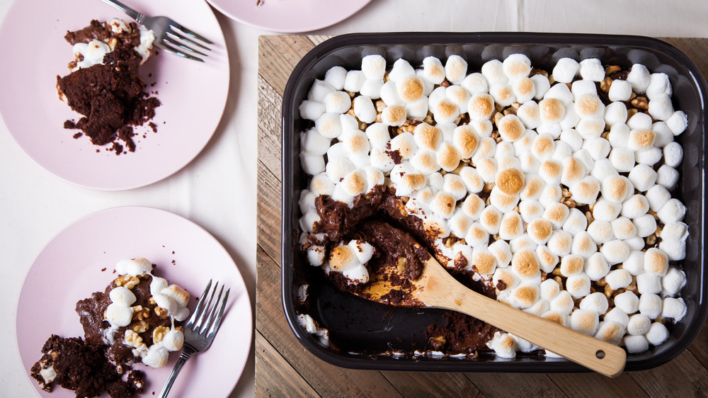 Mississippi mud cake topped with marshmallows in a pan