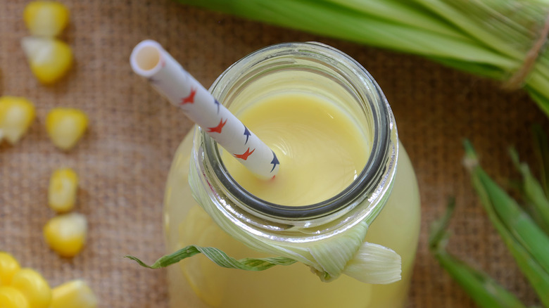 Corn juice with straw