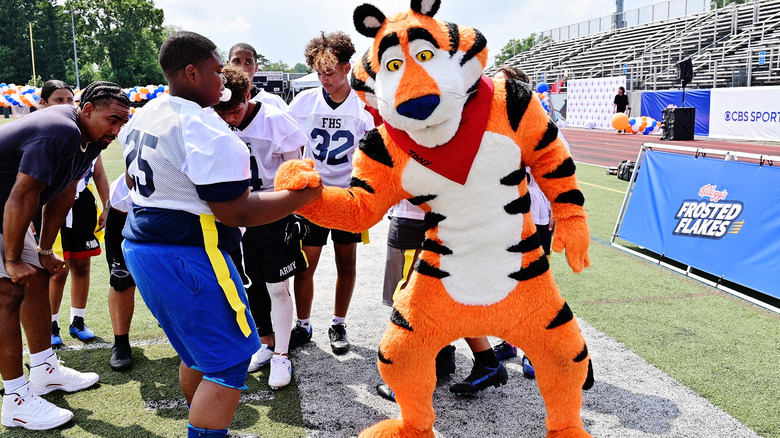 Tony the Tiger mascot with youth sports 