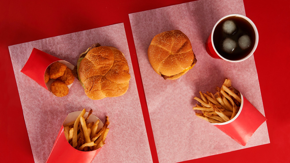Two Wendy's meals on red background