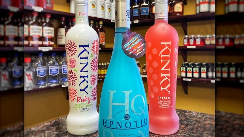 Hpnotiq and Kinky liqueur bottles