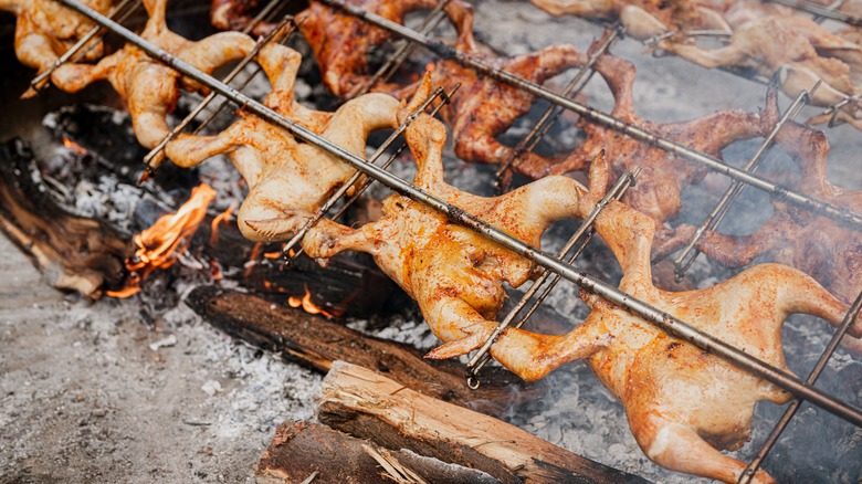 Huli huli chicken being grilled