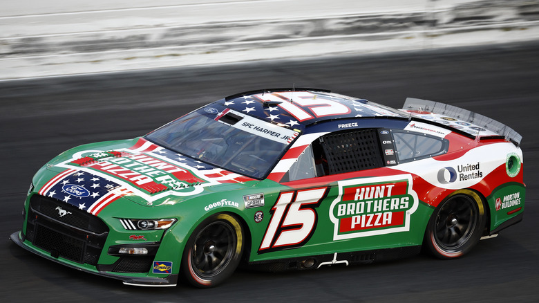 Green and red Ford car