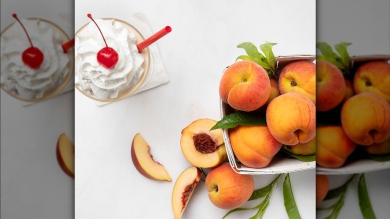 milkshake and pile of fresh peaches