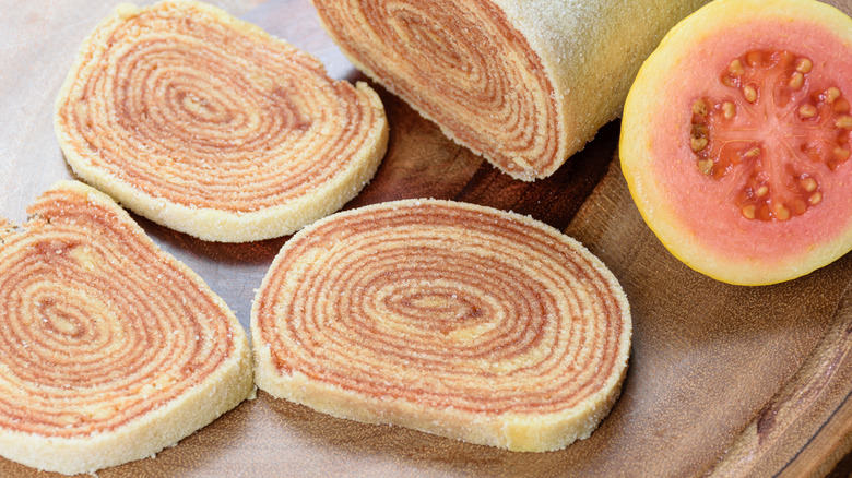 Slices of bolo de rolo with cut guava