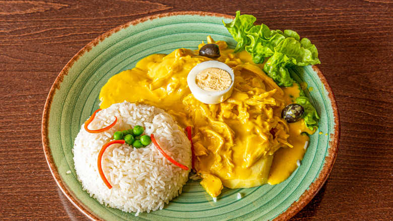 Peruvian spicy creamed chicken with rice