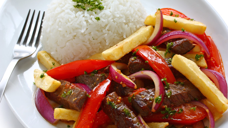 Peruvian beef stir-fry with fries and white rice