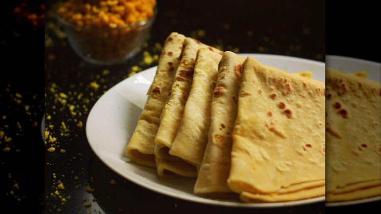 Folded dholl puri on a plate