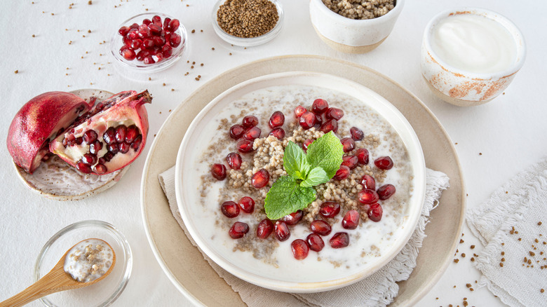 Bowl of thiakry with pomegranate