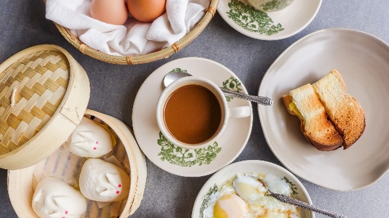 A traditional Singaporean breakfast on a grey background