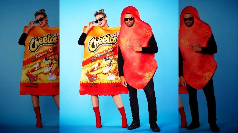 Couple in Flamin' Hot Cheetos costumes