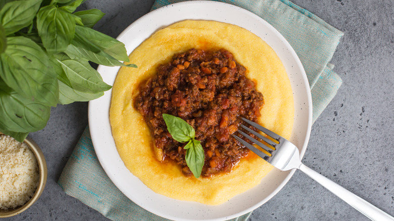 polenta topped with bolognese sauce