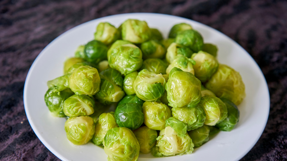 A plate of cooked Brussels sprouts