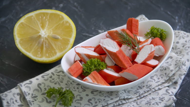 imitaiton crab in bowl with lemon