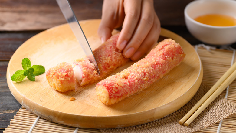 cutting fried imitation crab sticks