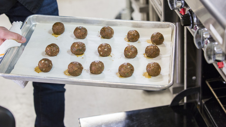 Impossible meatballs coming out of the oven